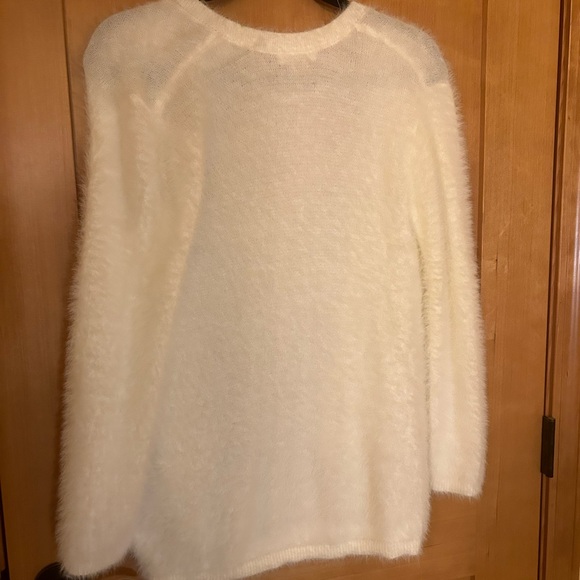 Fuzzy cardigan will fit anyone from size xs,s, and m. - Picture 2 of 4